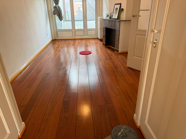 Houten vloer na renovatie door Woodler